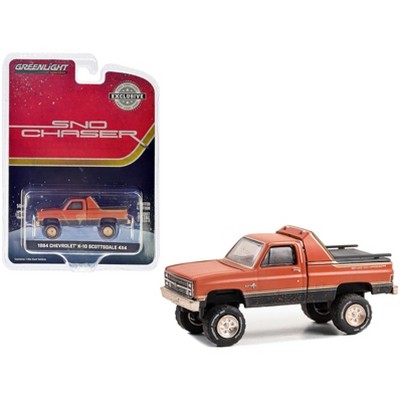 1984 Chevrolet K-10 Scottsdale 4x4 Truck Red and Black with Gold Stripes (Weathered) 1/64 Diecast Model Car by Greenlight