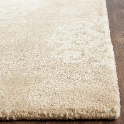 Beige and Ivory Tufted Wool and Viscose 9' x 12' Area Rug