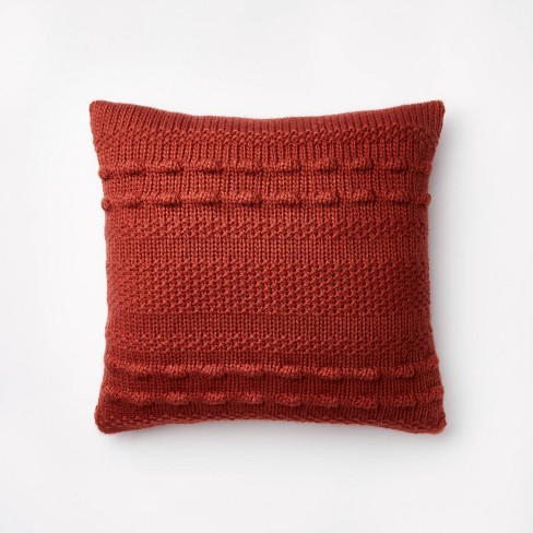 Red best sale knit pillow