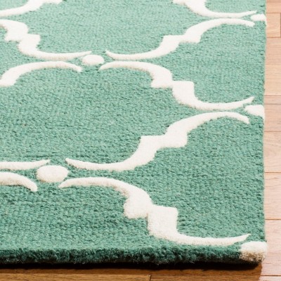 Teal and Ivory Hand-Tufted Wool 6' x 9' Area Rug