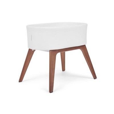 Delta Children Aero Bassinet Modern Portable Baby Crib with Solid Wood Legs, Mattress Pad and Fitted Sheet - White