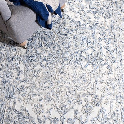 Ivory and Blue Hand-Tufted Wool Area Rug, 5' x 8'