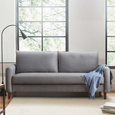 Couch with wooden discount arms