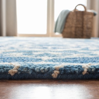 Handmade Blue and Ivory Wool Tufted Area Rug 4' x 6'