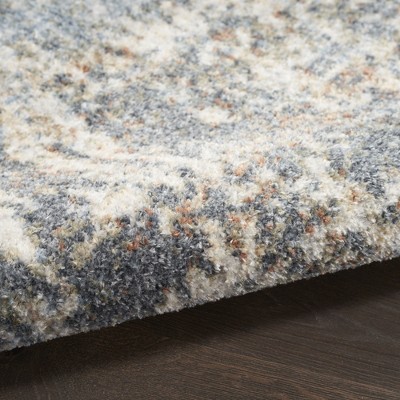 Ivory Abstract Synthetic 3'3" x 5' Easy-Care Area Rug