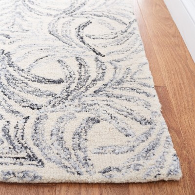 Ivory and Grey Floral Tufted Wool Area Rug 8' x 10'