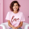 Simply Sage Market Women's Love Is All You Need Short Sleeve Graphic Tee - 2 of 4