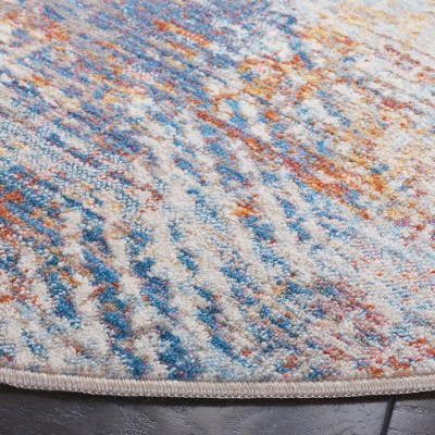 Vintage Blue and Rust Round Synthetic Area Rug