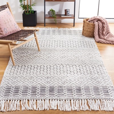 Handmade Black and Ivory Round Tufted Shag Rug