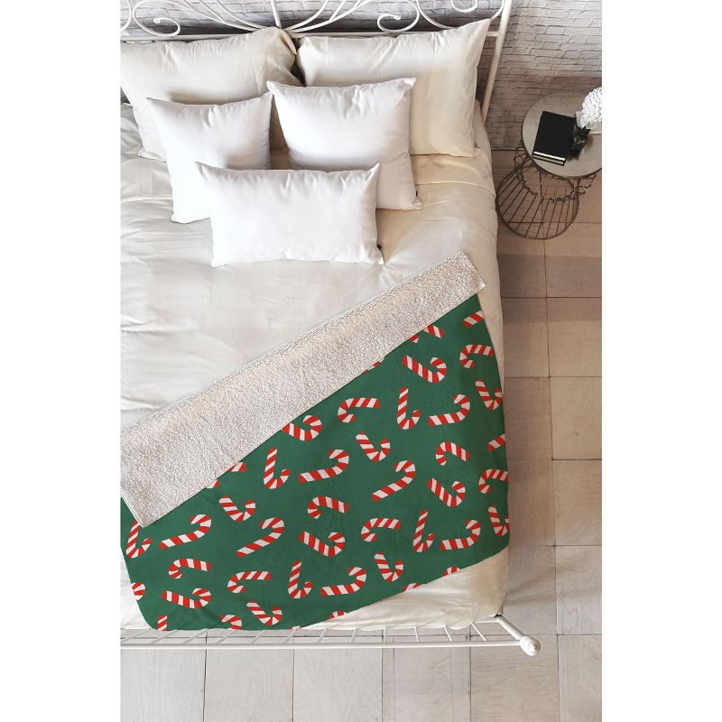 Lathe & Quill Candy Canes Green Fleece Throw Blanket -Deny Designs, 1 of 3