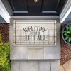 Stupell Industries Rustic Welcome Cottage Trees Printed Outdoor Door Mat, design by Kim Allen, 18"x30" - 3 of 4