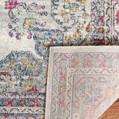 8' x 10' Cream and Fuchsia Synthetic Reversible Area Rug
