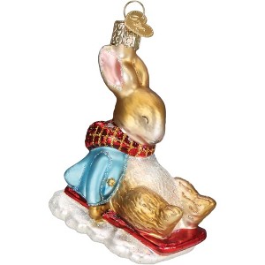 Old World Christmas Blown Glass Ornament for Christmas Tree, Peter Rabbit On Sled - 1 of 4