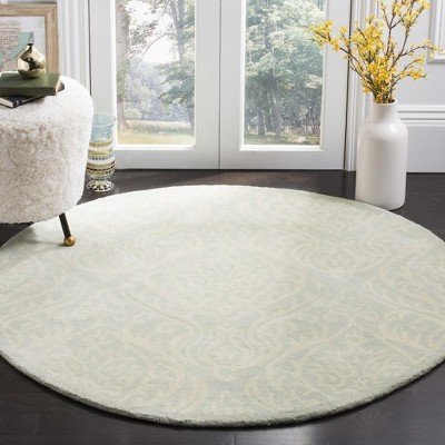 Ivory and Silver Round Hand-Tufted Wool Area Rug
