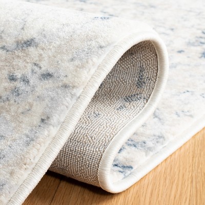 Ivory and Navy Rectangular Hand-knotted Synthetic Area Rug