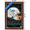 Trends International NFL Miami Dolphins - Neon Helmet 23 Framed Wall Poster Prints - 3 of 4