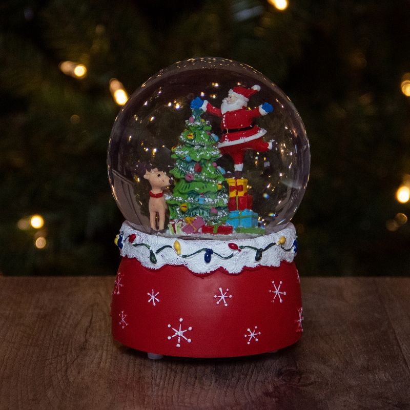 Northlight 5.75" Santa Decorating a Christmas Tree Musical Snow Globe, 2 of 5