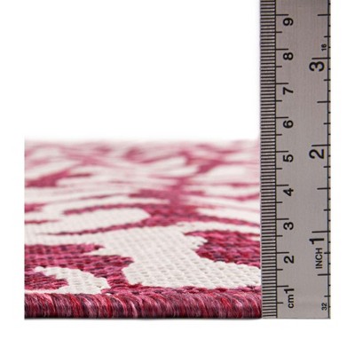 Magenta and White Synthetic 4' x 6' Outdoor Area Rug