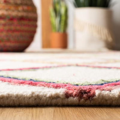 Ivory and Multi Geometric Wool 5' x 8' Area Rug