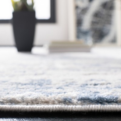 Amelia Ivory and Blue Abstract 3' x 5' Synthetic Area Rug