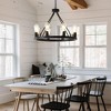 BAOURE 8-Light (No Bulbs) Matte Black Wagon Wheel Chandelier Farmhouse Modern Small Round Chandelier for Living Room Kitchen Island Foyer Hallway - 4 of 4
