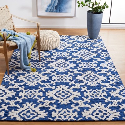 Ivory and Navy Hand Tufted Wool 4' x 6' Area Rug