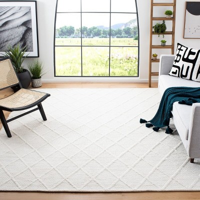 Ivory Hand-Tufted Wool and Viscose 9' x 12' Area Rug