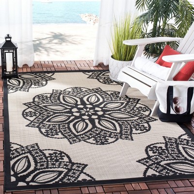 Beige and Black Synthetic Round Medallion Area Rug