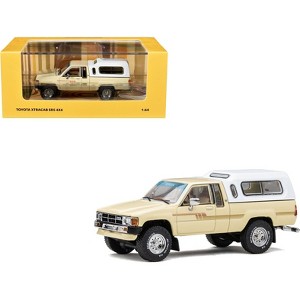 Toyota XtraCab SR5 4x4 Pickup Beige with White Camper Shell