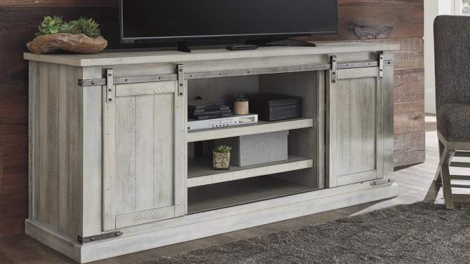 Carynhurst TV Stand for TVs up to 65" - Signature Design by Ashley, 2 of 12, play video