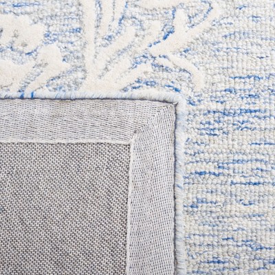 Handmade Blue Floral Tufted Wool Area Rug