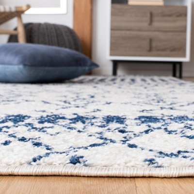 Ivory and Navy Moroccan Geometric 4' x 6' Area Rug