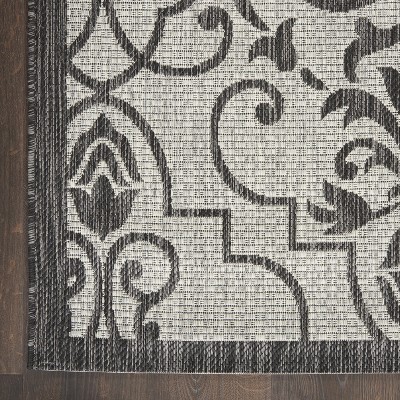 Ivory & Charcoal Round Synthetic Indoor/Outdoor Area Rug