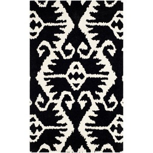 Wyndham WYD323 Hand Tufted Indoor Rugs - Safavieh - 1 of 4