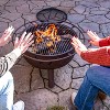 Sunnydaze Outdoor Camping or Backyard Round Cosmic Stars and Moons Fire Pit with Cooking Grill Grate, Spark Screen, and Log Poker - 30" - 3 of 4