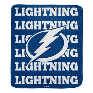 NHL Tampa Bay Lightning Repeat Logo Wordmark Ultra Soft Blanket - 1 of 1
