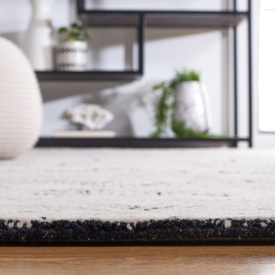 Metro Black and Ivory Hand-Tufted Wool Area Rug 8' x 10'