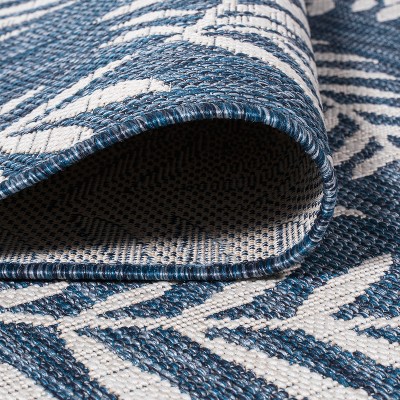5' x 8' Navy and Ivory Palm Frond Indoor/Outdoor Area Rug