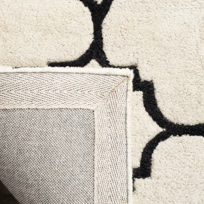 Ivory and Black Hand-Tufted Wool Area Rug, 5' x 8'