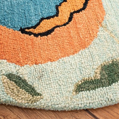 Handmade Round Blue Floral Wool Area Rug