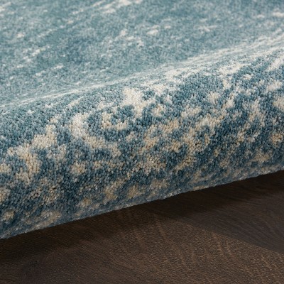Ivory and Teal Abstract Flat Woven Synthetic Rug, 5' x 7'