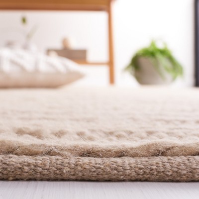 Ivory Coastal Hand-Woven Wool Rectangular Rug