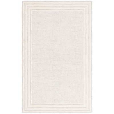 Ebony EBN425 Handmade Tufted Rug - Safavieh