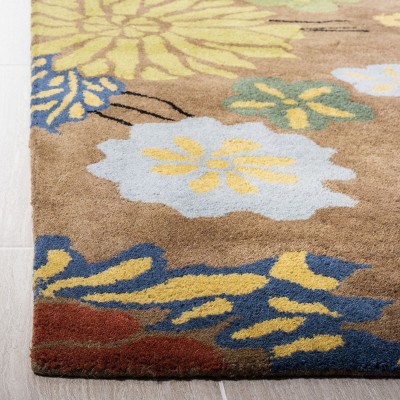 Handmade Brown and Multicolor Floral Wool Area Rug