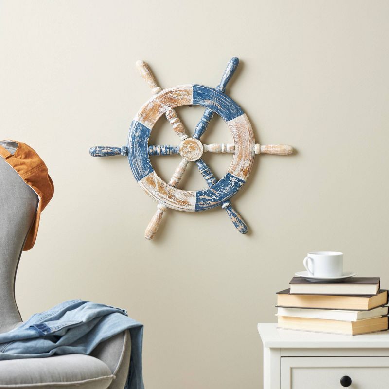 Olivia &#38; May 22&#34;x19&#34; Wood Ship Wheel Distressed Two-Toned Wall Decor with Brown Accents Blue, 2 of 8