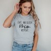 Simply Sage Market Women's Eat. No Sleep. Mom. Repeat Short Sleeve Graphic Tee - 2 of 3