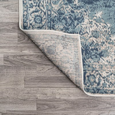 Ivory and Blue Medallion 8' x 10' Synthetic Area Rug