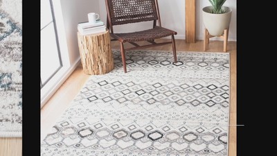 Hand-Knotted Elegance Synthetic Black Rectangular Rug