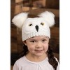 HalloweenCostumes.com One Size Fits Most   Harry Potter Hedwig Owl Pom Knit Beanie Hat for Toddlers, White/Yellow/Black - 2 of 4