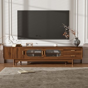 JANSNO 78" Modern TV Stand for 85" TVs with Fluted Glass Doors & 2 Drawers & Solid Wood Legs - 1 of 4
